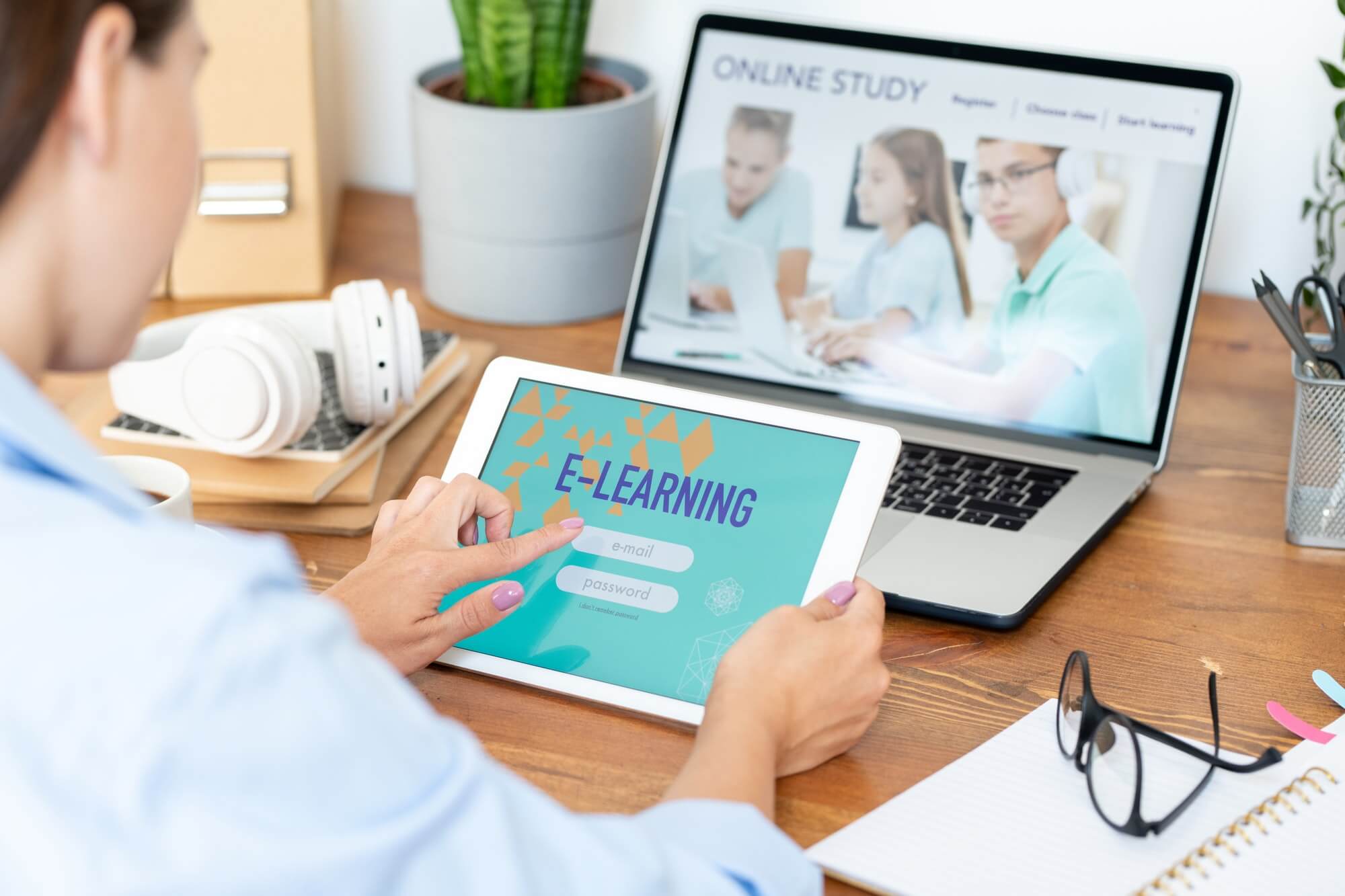 Young woman using digital tablet to sign in online educational site